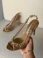 Aquazzura Temptation crystal sandals in a gold tone shade