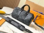 Louis Vuitton Keepall Bandouliére 25cm Monogram Eclipse coated canvas with black leather trim
