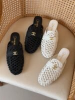 CHANEL Loafers in woven design & a signature CC logo