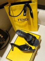 Fendi "Fold" Black leather kitten-heels sandals with gold-tone FF metal accent on the band - Image 3
