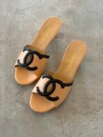 Chanel 2026 Lambskin Heeled Mules in Beige color & Black color CC logo on the strap