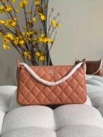 Chanel Diamond-quilted cavier leather clutch with chain an interlocking CC logo & a leather wrapped top handle - Image 2