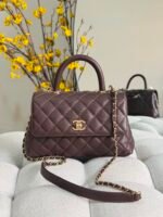 Chanel Flap Bags with Top handle chevron patterened with gold tone CC turn-lock closures - Image 4