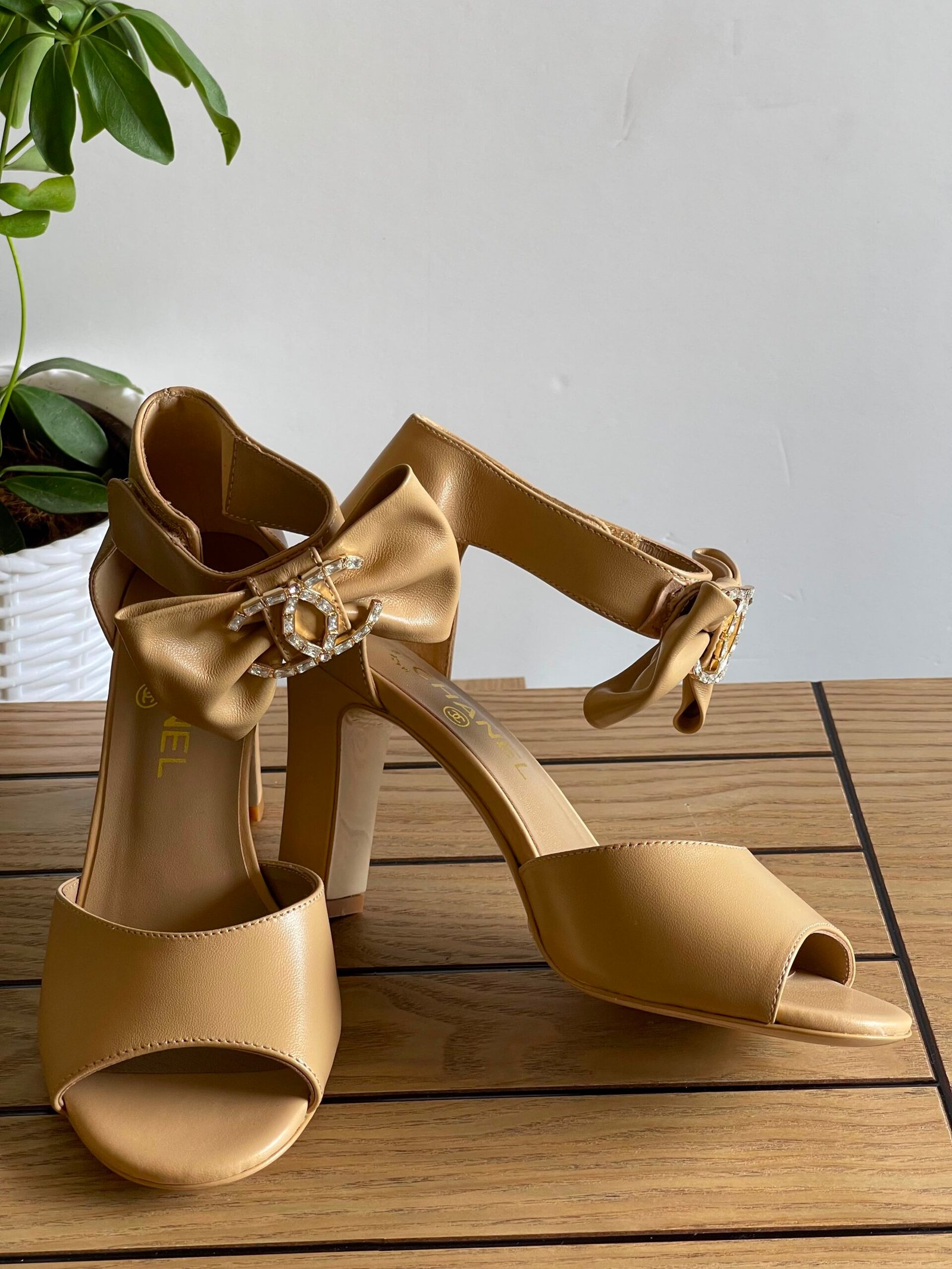 WhatsApp Image 2026-08-17 at 17.43.36 Beige Lambskin Chanel Block-heel sandals Decorative bow accented with Crystal CC logo - Image 1