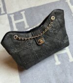 Chanel Braided Raffia Shopping Bag with iconic CC turn-lock closure