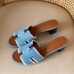 Hermès Oasis sandal in bleu clair fringed denim