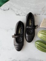 Chanel Quilted Leather Mary Jane flats with signature interlocking CC logo - Image 2