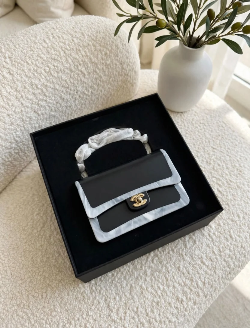 18438d83-fdc6-4f60-86cd-0ff31d65fa1a CHANEL Structured Top Handle Flap Box Bag - Image 1