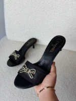 اChanel CC Bow Embellished Kitten Heel Mules - Image 6