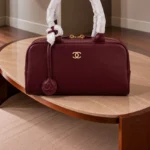 CHANEL Smooth Zip Top Handle Charm Bag