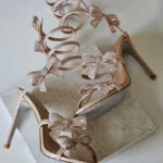 René Caovilla Cleo Crystal-Embellished Spiral Bow Sandals