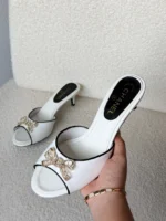 اChanel CC Bow Embellished Kitten Heel Mules - Image 3