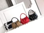 CHANEL Drawstring Top-Handle Chain Bag