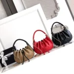 CHANEL Drawstring Top-Handle Chain Bag