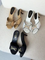 اChanel CC Bow Embellished Kitten Heel Mules