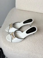 اChanel CC Bow Embellished Kitten Heel Mules - Image 2