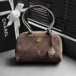 CHANEL Quilted Zip-Top Bowling Bag