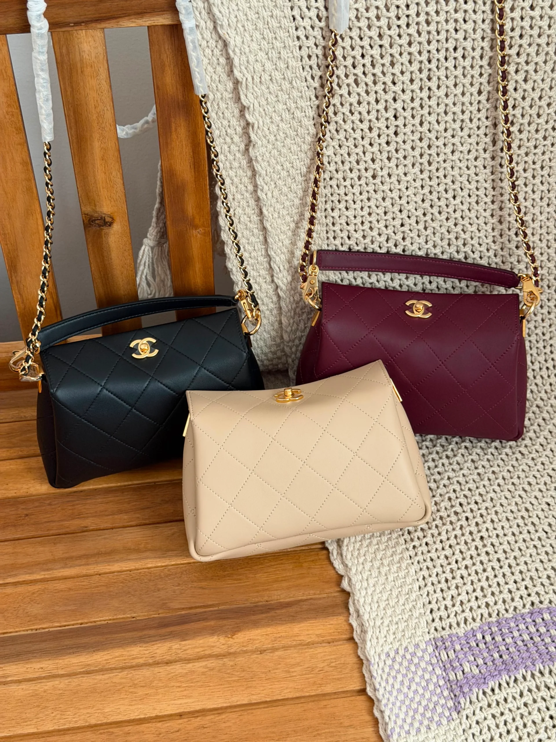 ec0b096a-e4ed-4ee2-a034-8bee830e65d5 CHANEL Diamond Quilted Top Handle Chain Bag - Image 1