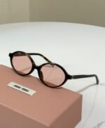 Miu Miu Oval Acetate Sunglasses (Model: SMU04Z / MU 04ZS) - Image 3