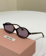 Miu Miu Oval Acetate Sunglasses (Model: SMU04Z / MU 04ZS) - Image 5